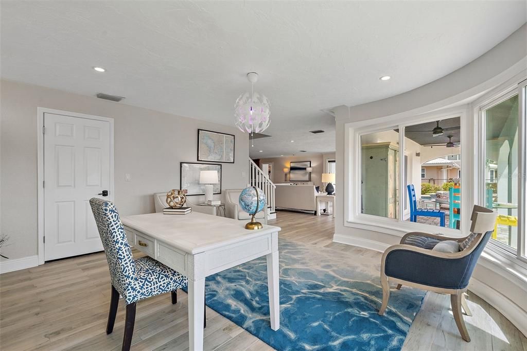 Huge under stairs storage behind white door