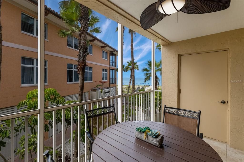 Beach and gulf views from screened lanai