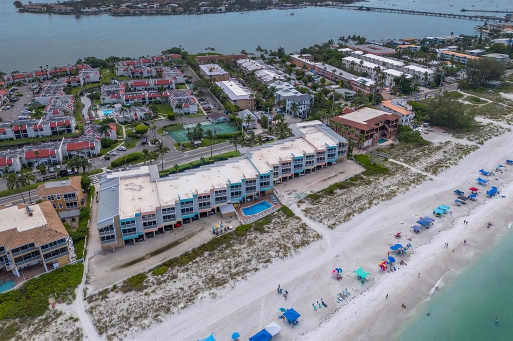 The heated pool is right on the beach!!