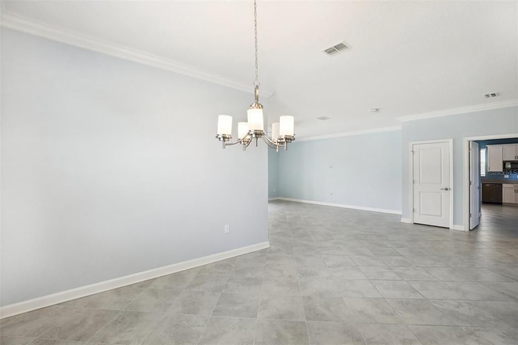 Formal Dining Room. You can also see the Pass-Through Door for the In-Law Suite. This is at the front of the House