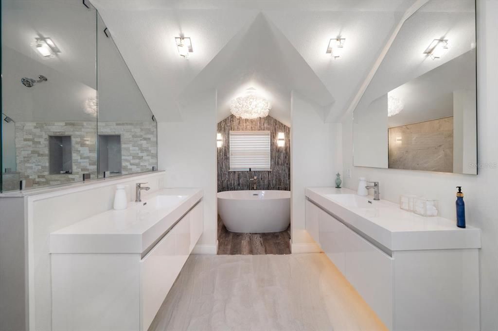 Double vanity sinks and beautiful soaking tub area