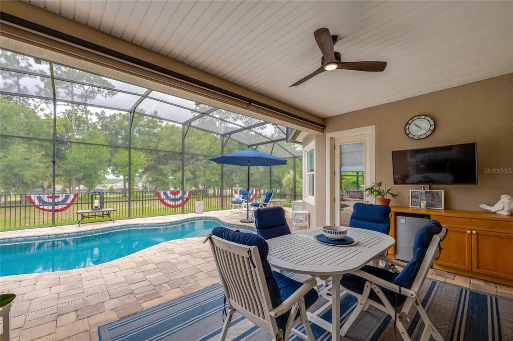 Covered lanai with remote control shade screen