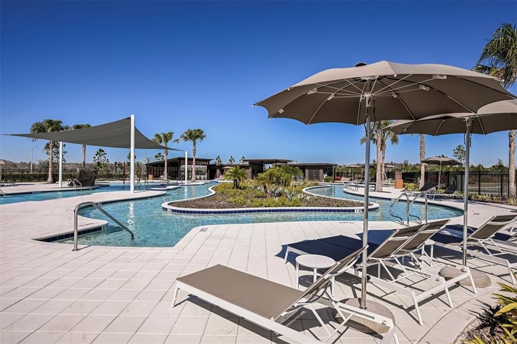 Master Community Clubhouse Pool Sundeck with View of Lazy River