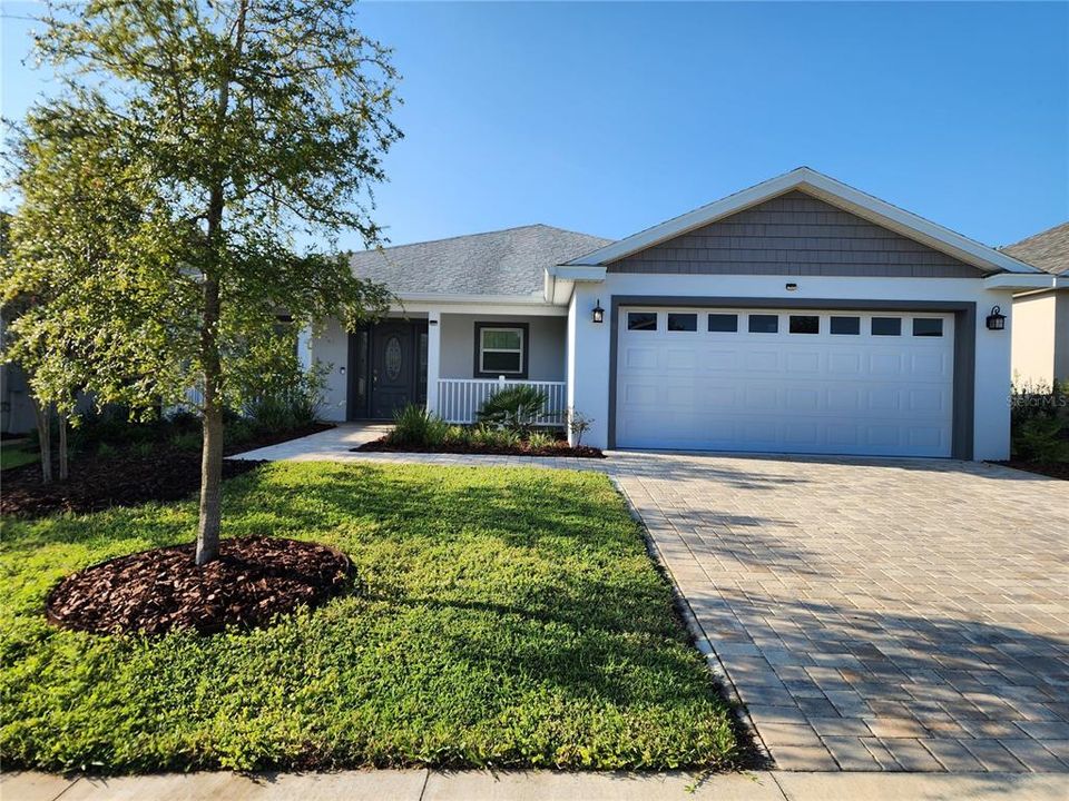 Front Elevation of the GORGEOUS 3 Bedroom, 2 Bath nestled in Densan Park. Brick Paver drive and walkways