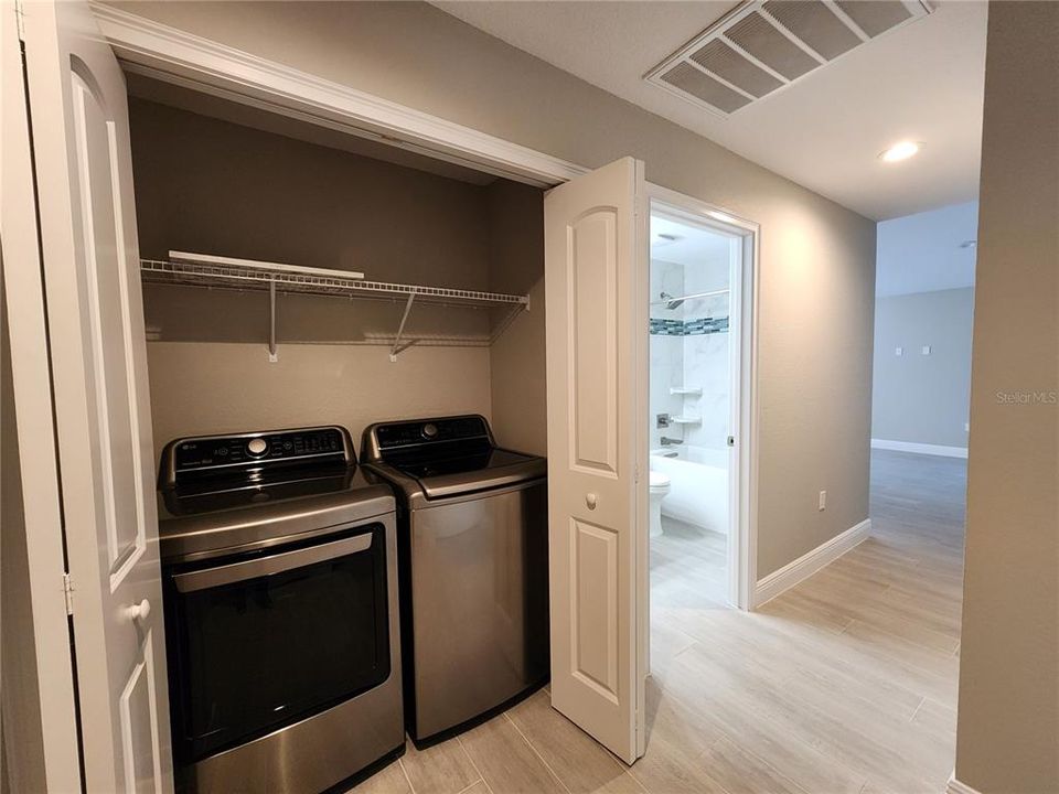 Laundry closet with washer and dryer