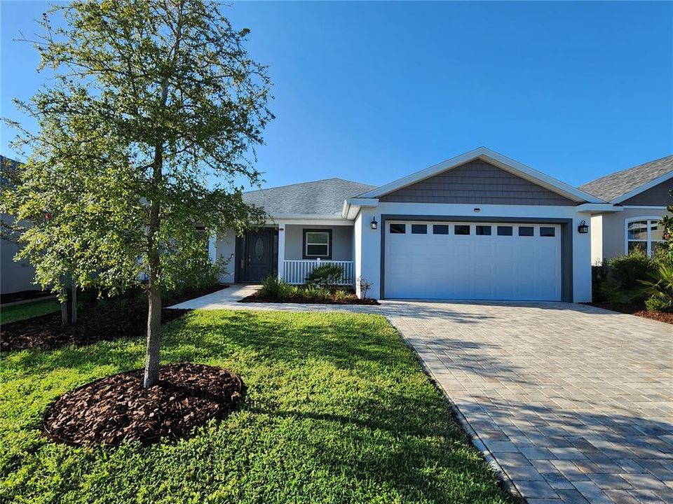 Front Elevation with lovely landscaping