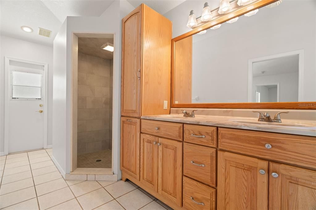 Primary Bathroom with Dual Sinks, New Fixtures, New Solid Wood Cabinets, Separate Garden Soaking Tub, Separate Shower