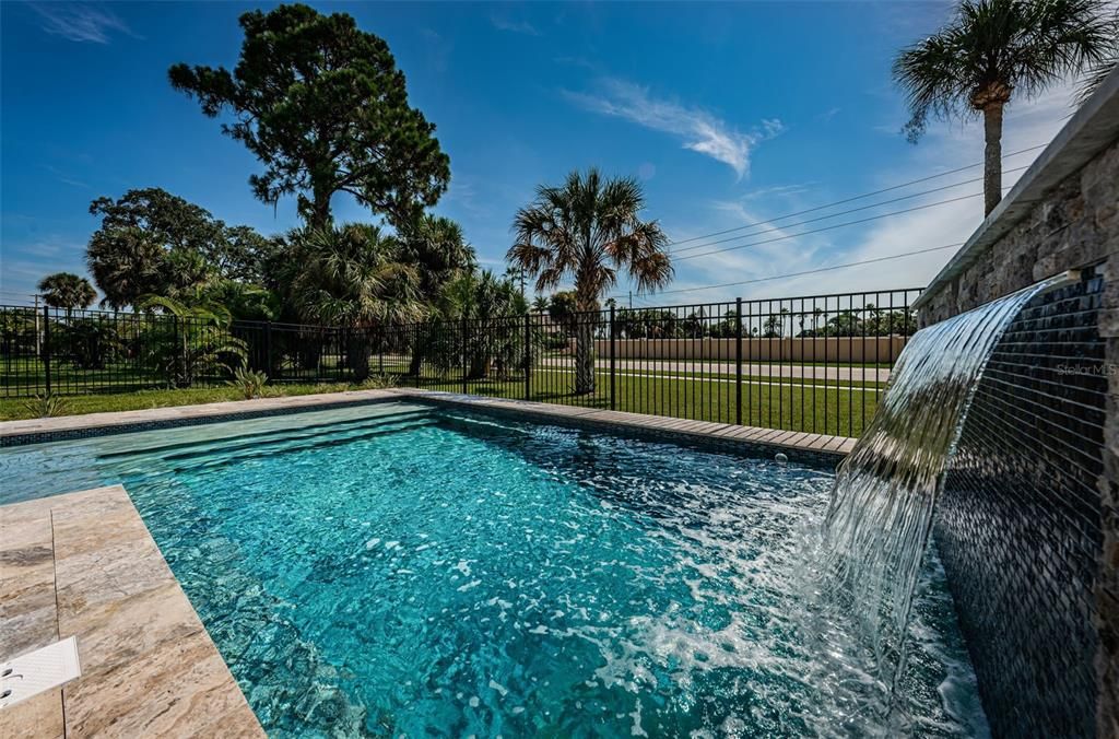 Travertine deck - Heated, Salt Water Pool with Waterfall feature