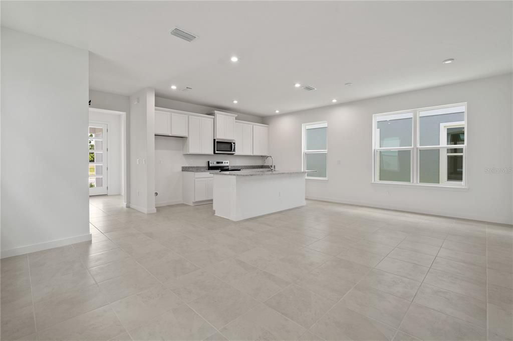 Spacious living room with eat-in kitchen.