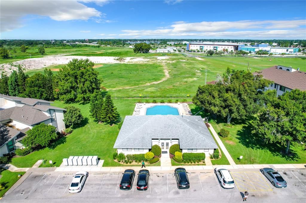 Clubhouse, community pool, and [beyond] future site of the NEW Chain of Lake Park!