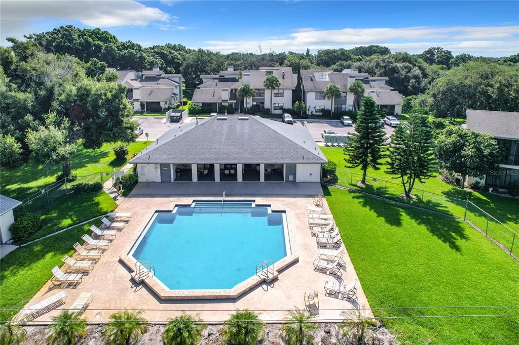 Community pool and clubhouse from Chain of Lakes Park.