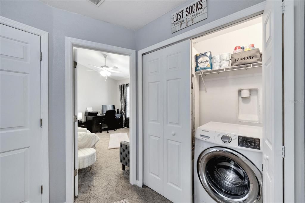 Indoor laundry at top of stairs.  Washer included, dryer hookup ready for dryer