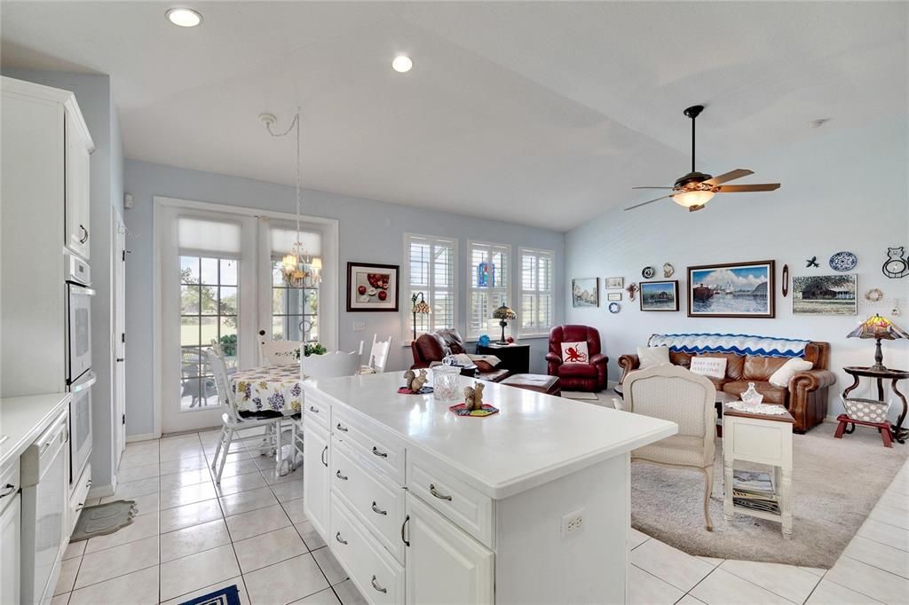 Kitchen with island, dinette, and family room!