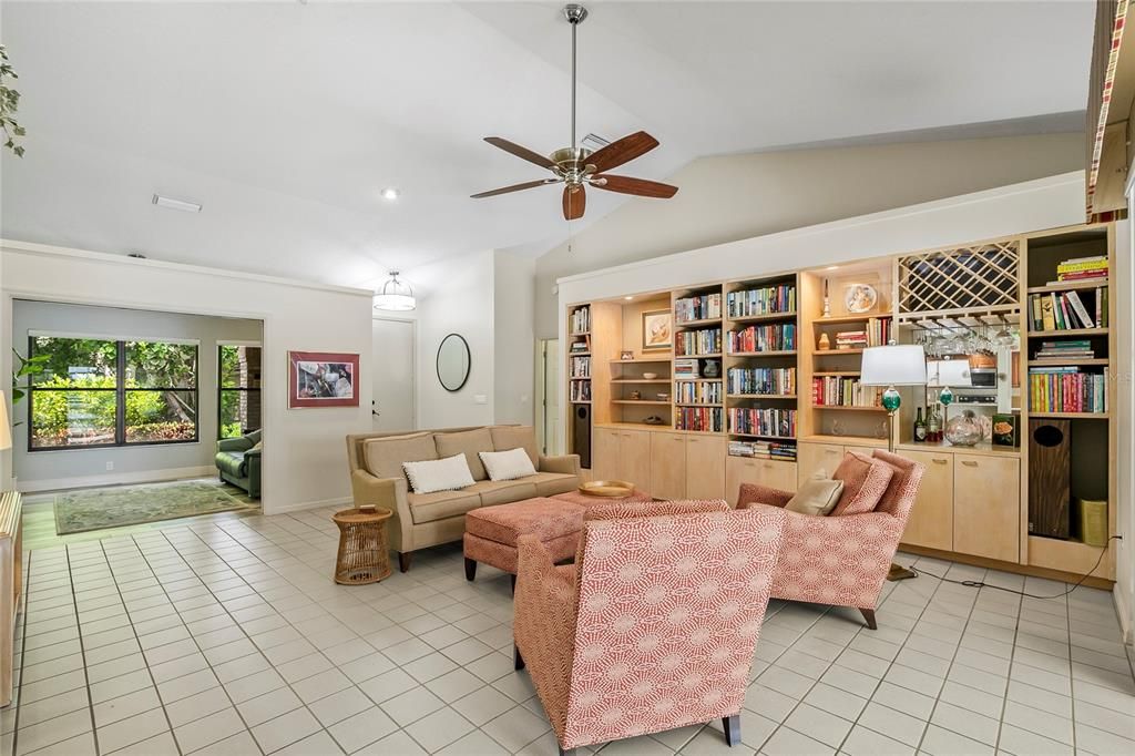 Main living area with built in bookshelves