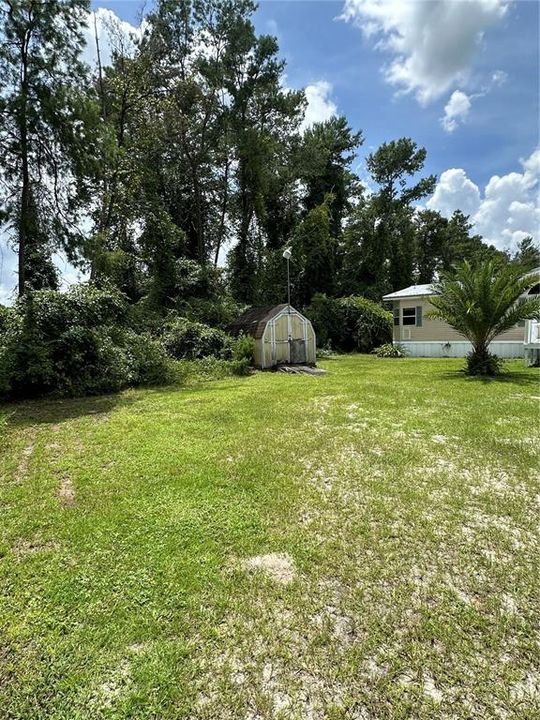 numerous outbuildings and sheds to store equipment