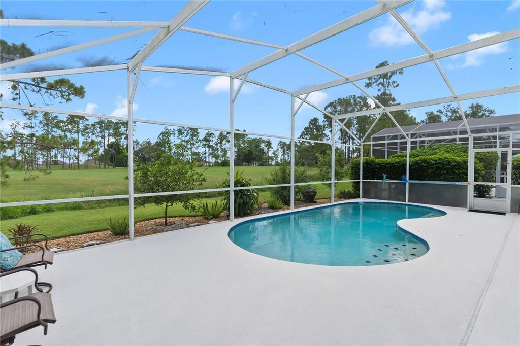 Pool overlooking golf course