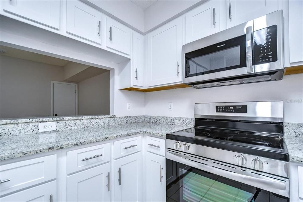 Kitchen w/ Brand New Stainless Steel Appliances