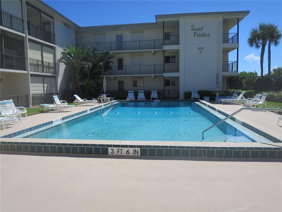 Salt water, solar heated pool. B-8 2nd floor shutters down.