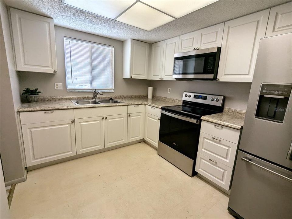 Spacious updated kitchen just freshly painted