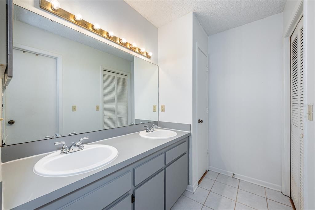 The owner’s en-suite is very spacious with a walk-in closet, separate linen closet, and dual sinks on a spacious vanity.