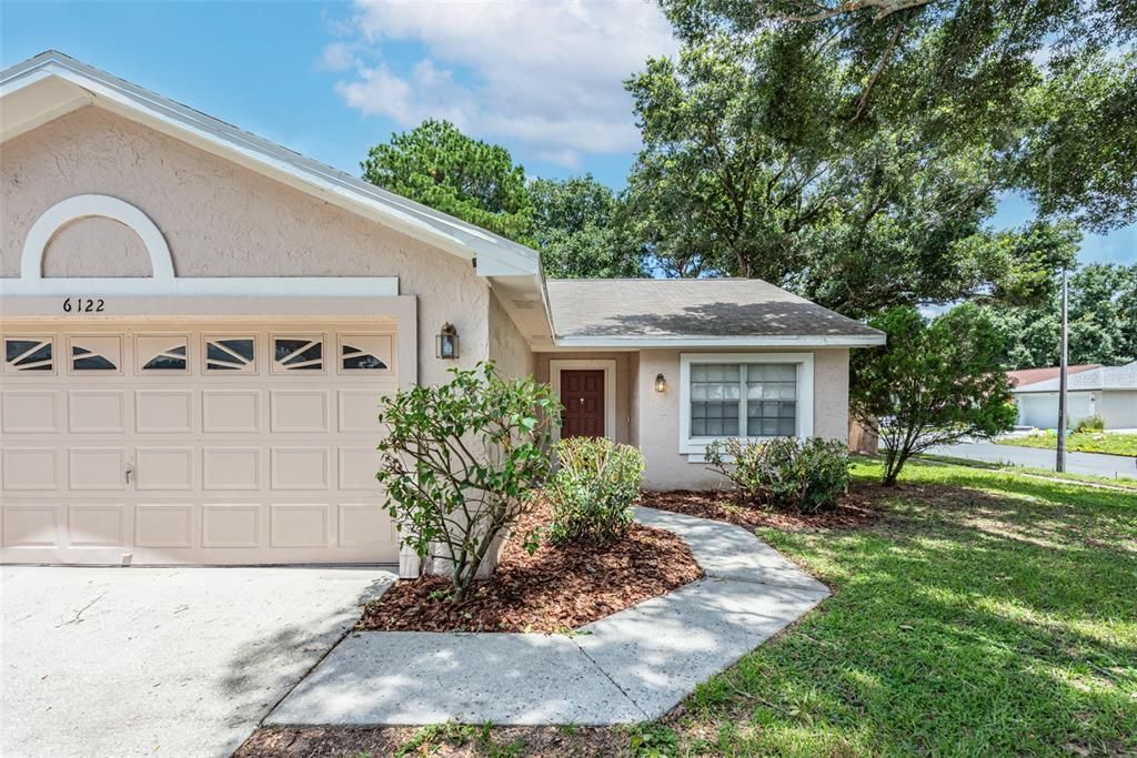 Low maintenance curb appeal, welcomes you to this charming 3 bedroom, 2 bathroom home on a corner lot.