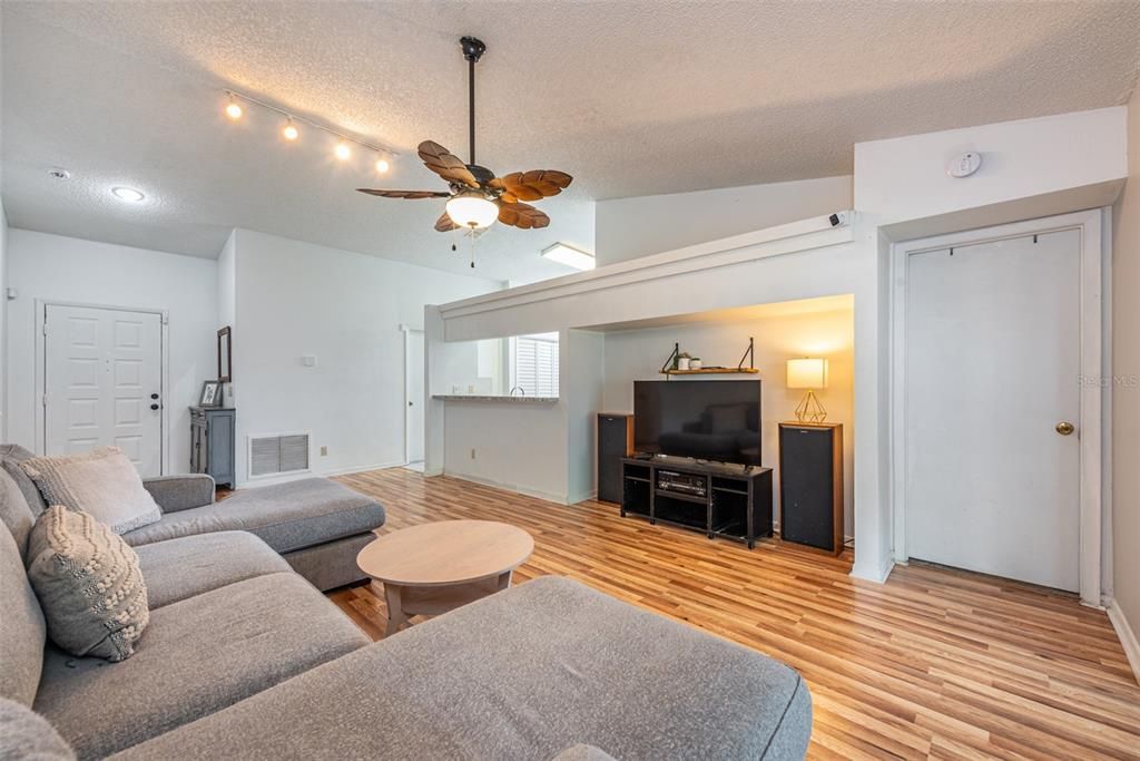 The kitchen connects to the living room making the design perfect for family gatherings and entertaining!