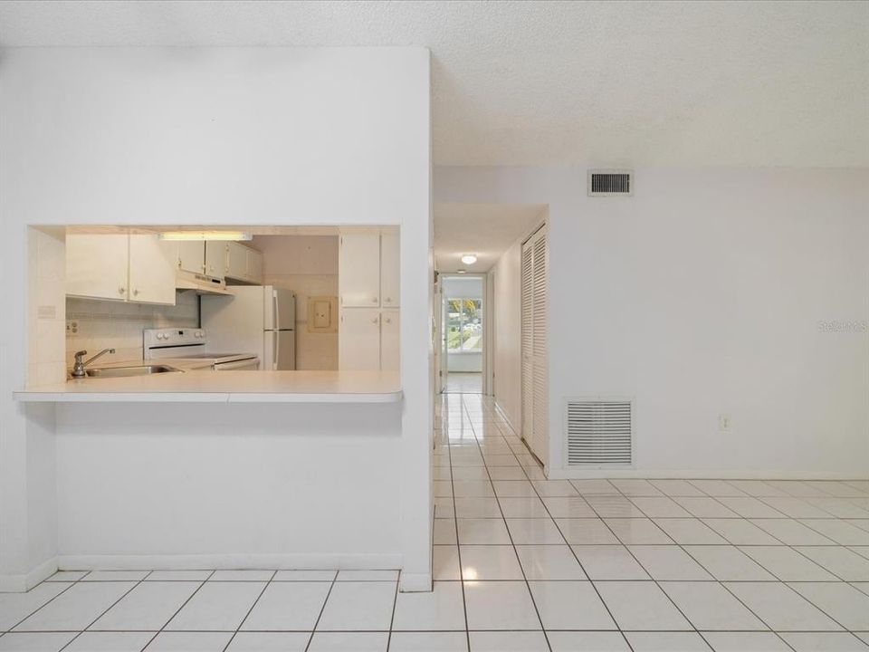 View looking into the kitchen & hallway