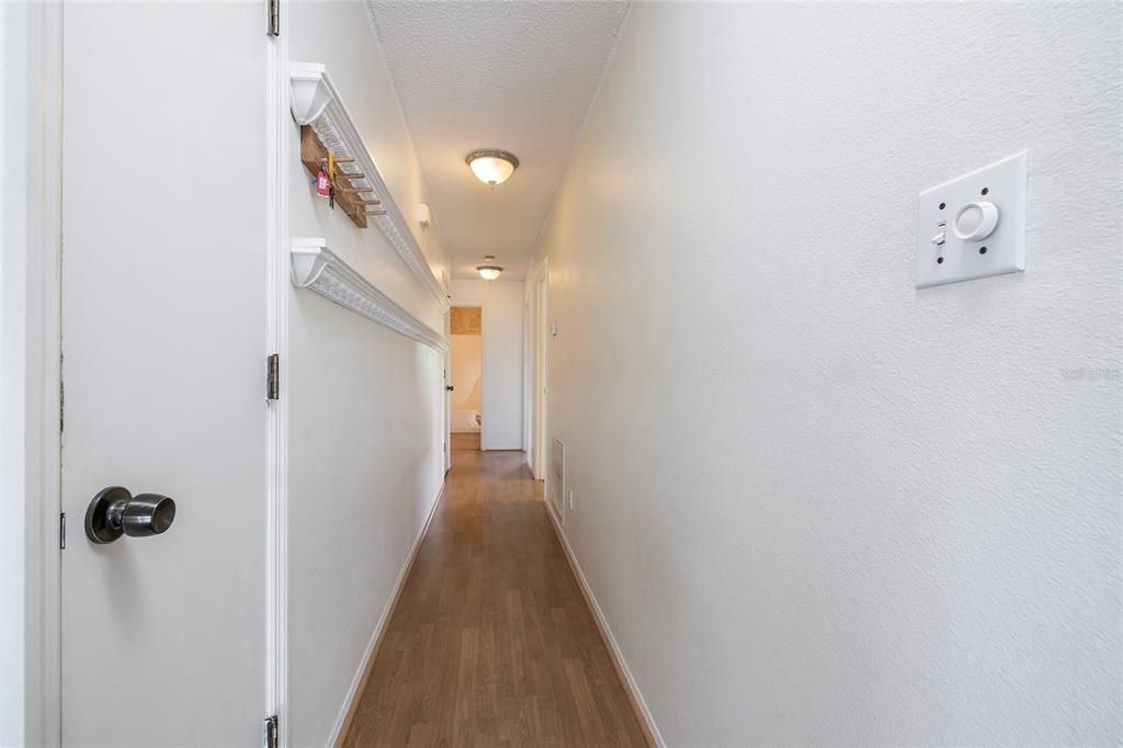 Hallway leading to the Bedrooms and Laundry Room