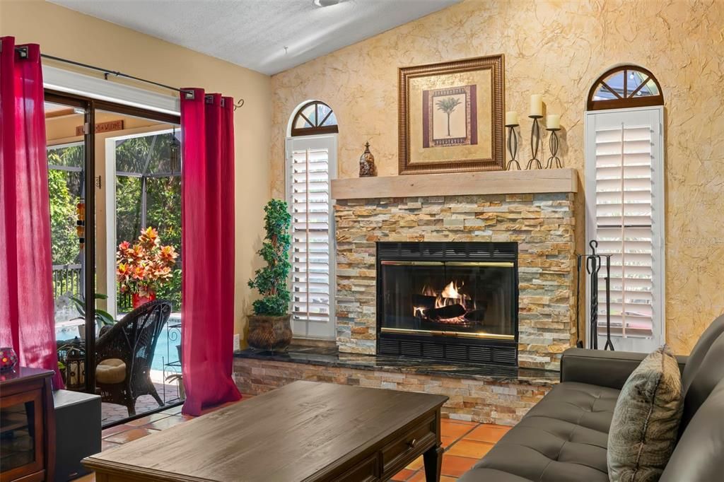 Living Room Fireplace with Pool Access