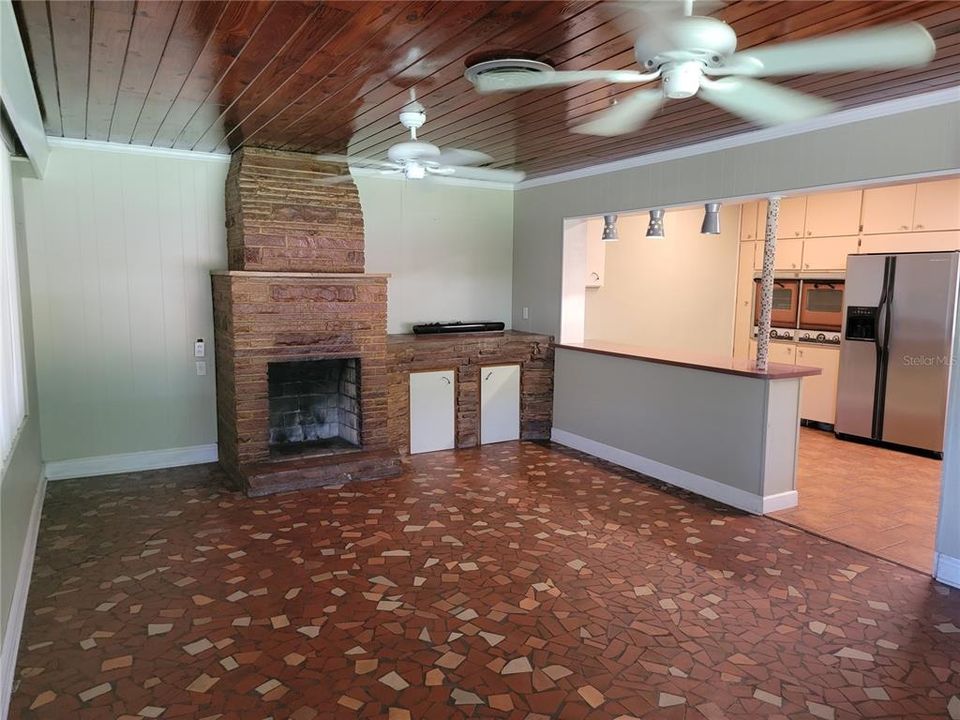 Family room with wood burning fireplace