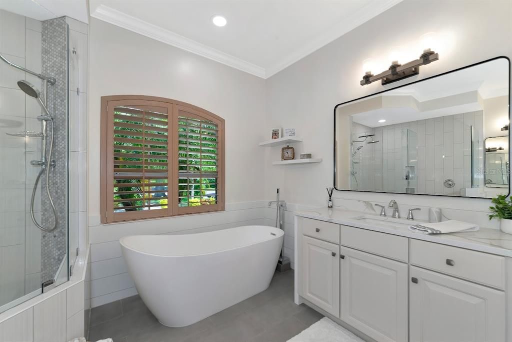 Garden Tub, quartz countertops, new lighting.