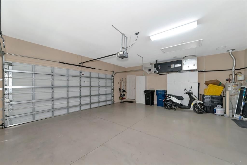 Side Load Garage with storage cabinets