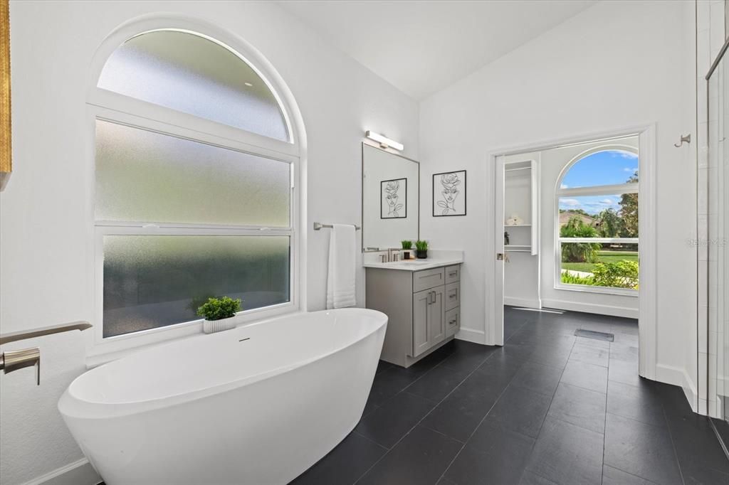 Primary Bathroom: Two Vanities and Tub