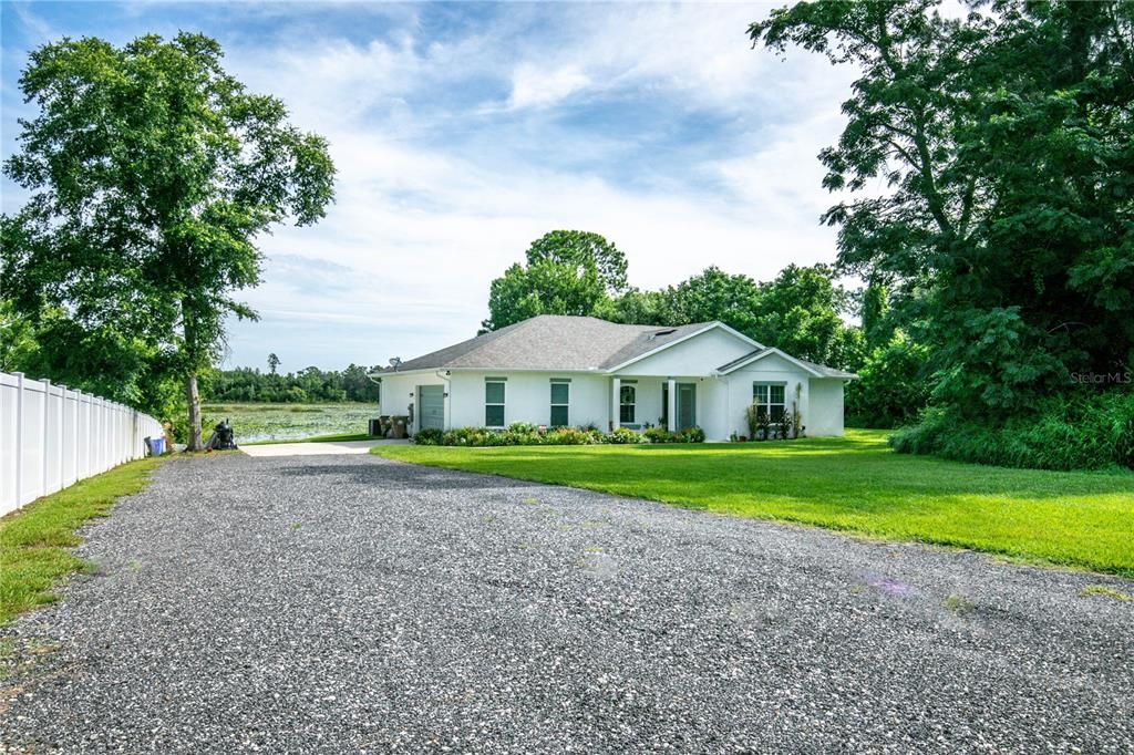 Long driveway leading to your new home.