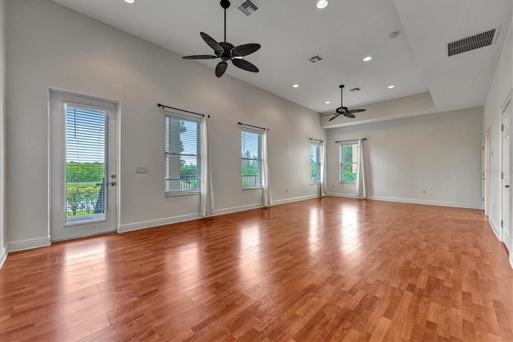 First Floor Open Space with door out to first floor Lanai/backyard  Also FULL bath on this floor