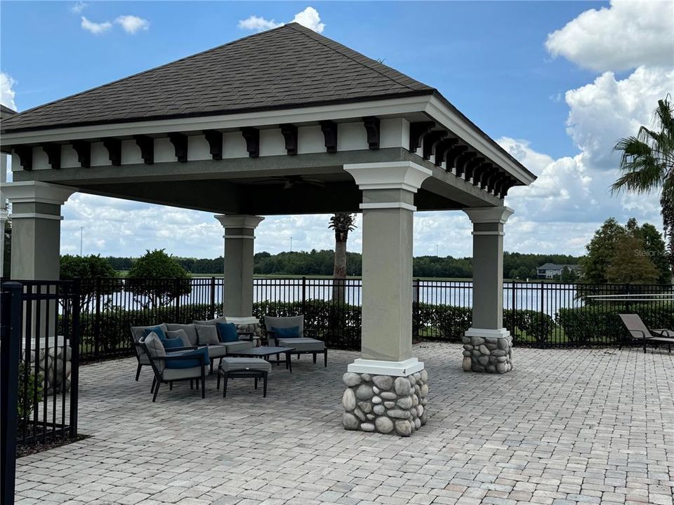 Gazebo by the community pool overlooking a pond