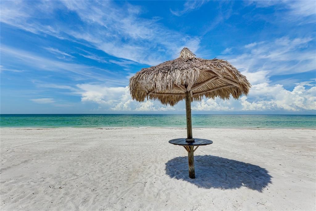 Relax in the tiki huts located right on the beach, exclusively for residents.