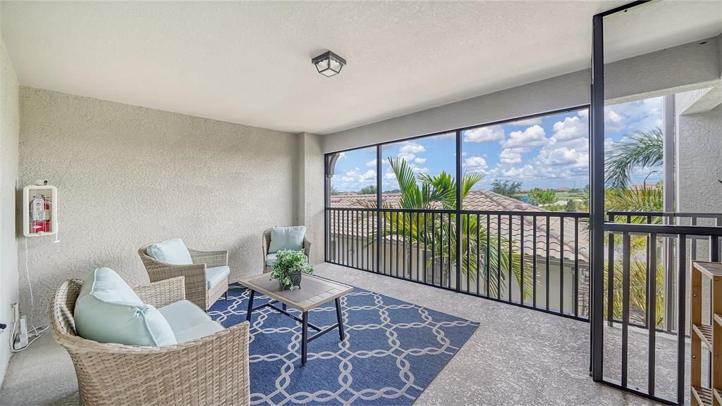 Looking out to garage and sidewalk.