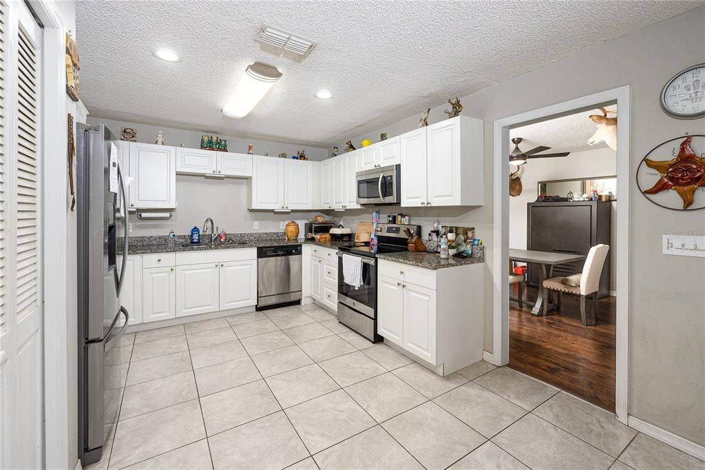 stainless steel appliances and stone countertops