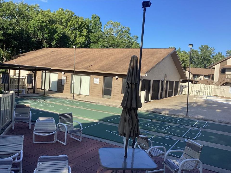 Clubhouse with games, pool and spa.