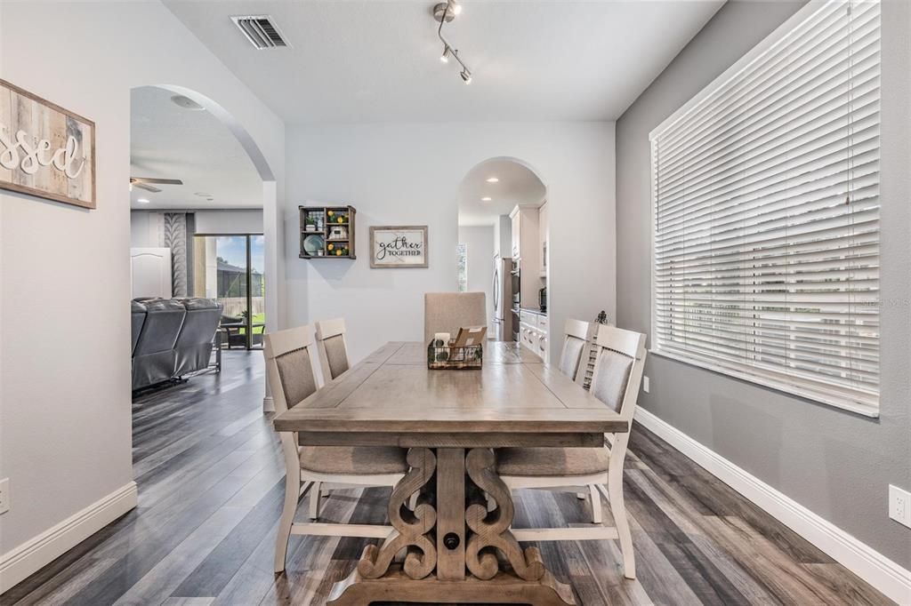 dining room with view of kitchen and living room