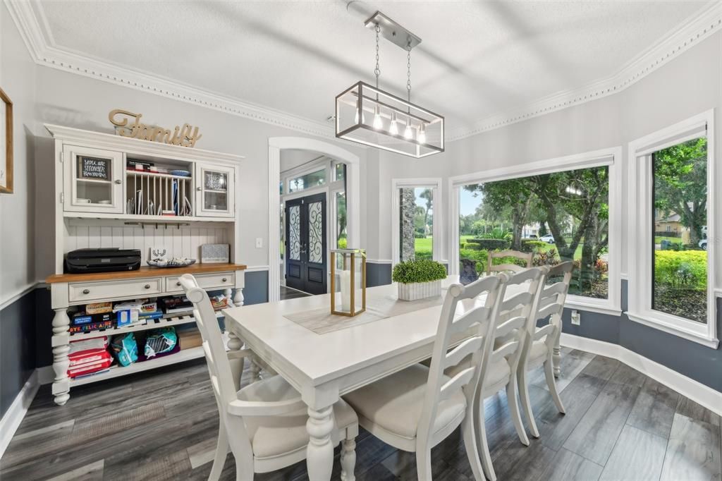 Dining room at the front of the home with gorgeous windows allowing picturesque views of the front yard