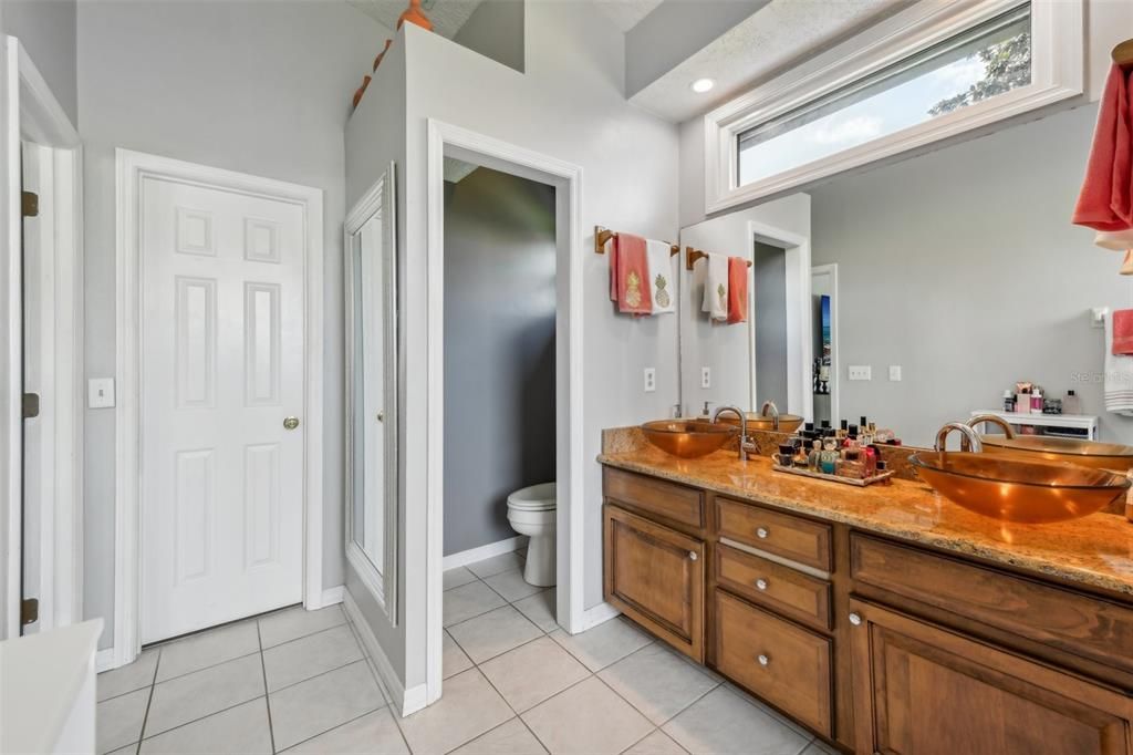 Primary bathroom features a large 10x12 walk in closet and water closet