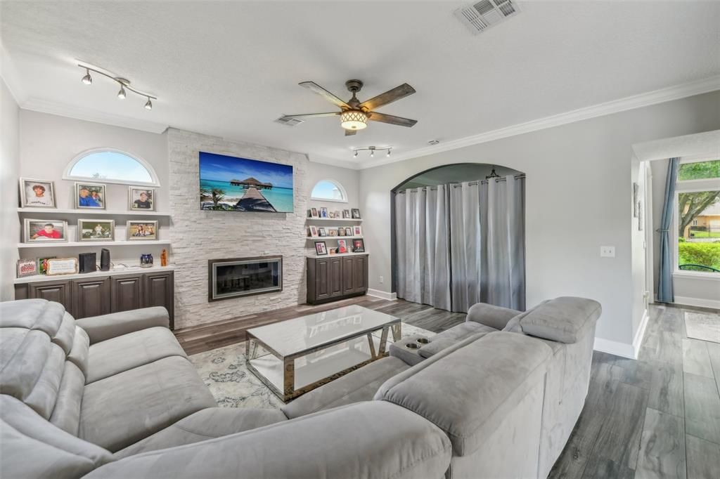 Living room has a study area through the archway