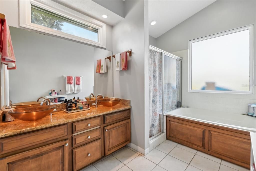 Primary bathroom with double sink vanity