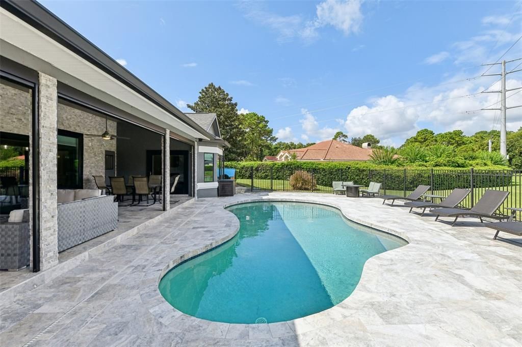 Stone accents on columns and back exterior wall