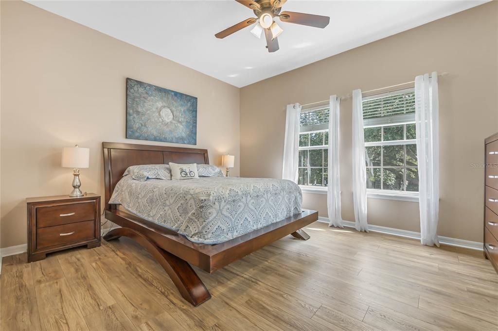 All of the bedrooms are upstairs including a generous PRIMARY SUITE with WOOD LAMINATE FLOORS that continue into the landing.