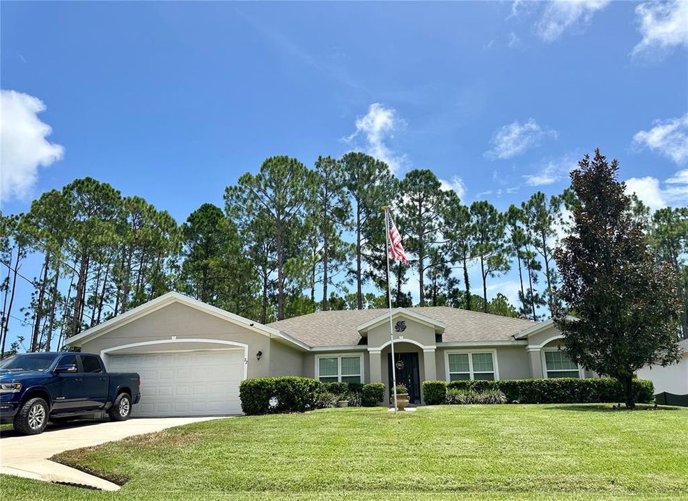 Front driveway, 2 car garage and front entry