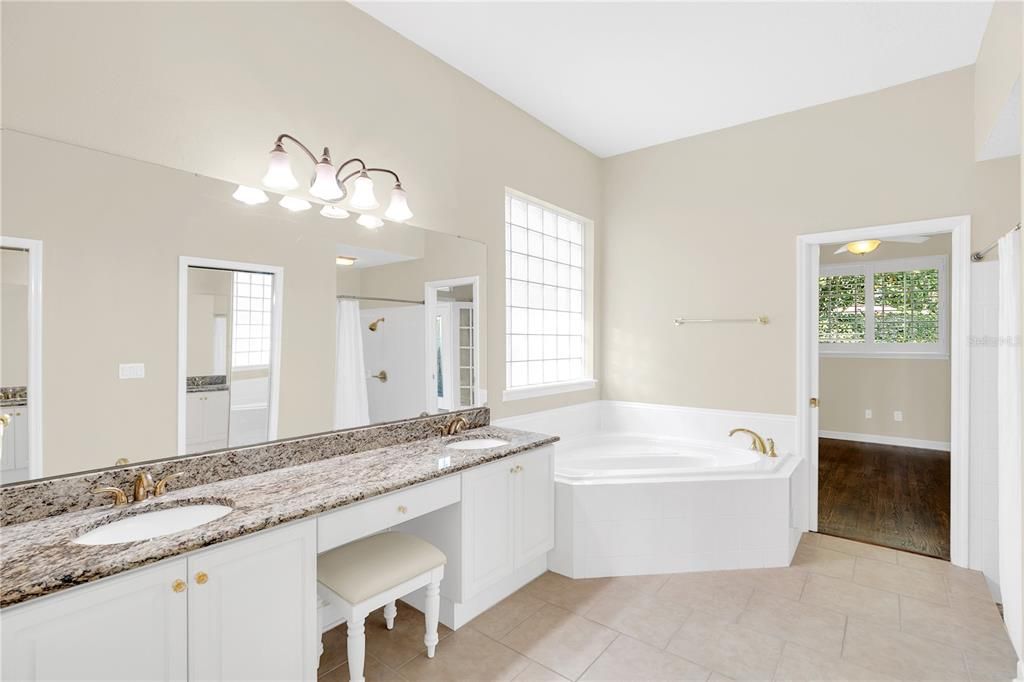 Primary Bathroom with Dual Vanities & Garden Tub