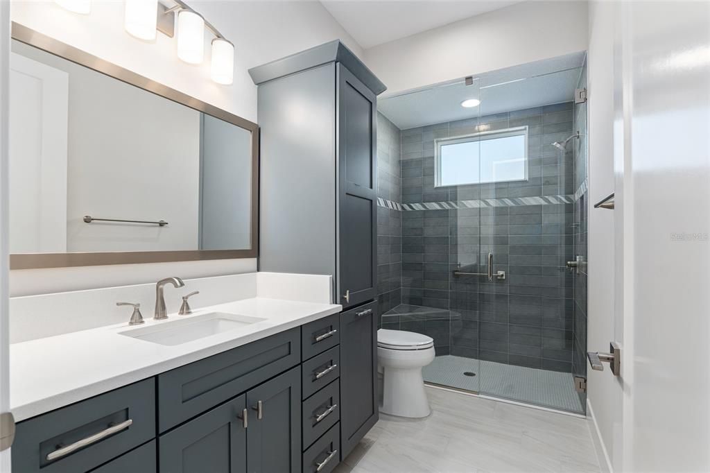 MASTER BATHROOM - TWO SINKS ONE IN FRONT OF THE OTHER AND LINEN CLOSET